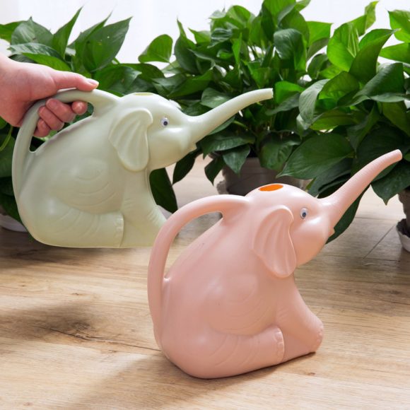 Baby elephant watering flowers - Image 7