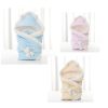 Newborn baby being hugged and swaddled by baby - Image 4