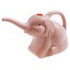 Baby elephant watering flowers - Image 2