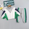 Boy sports wind suit